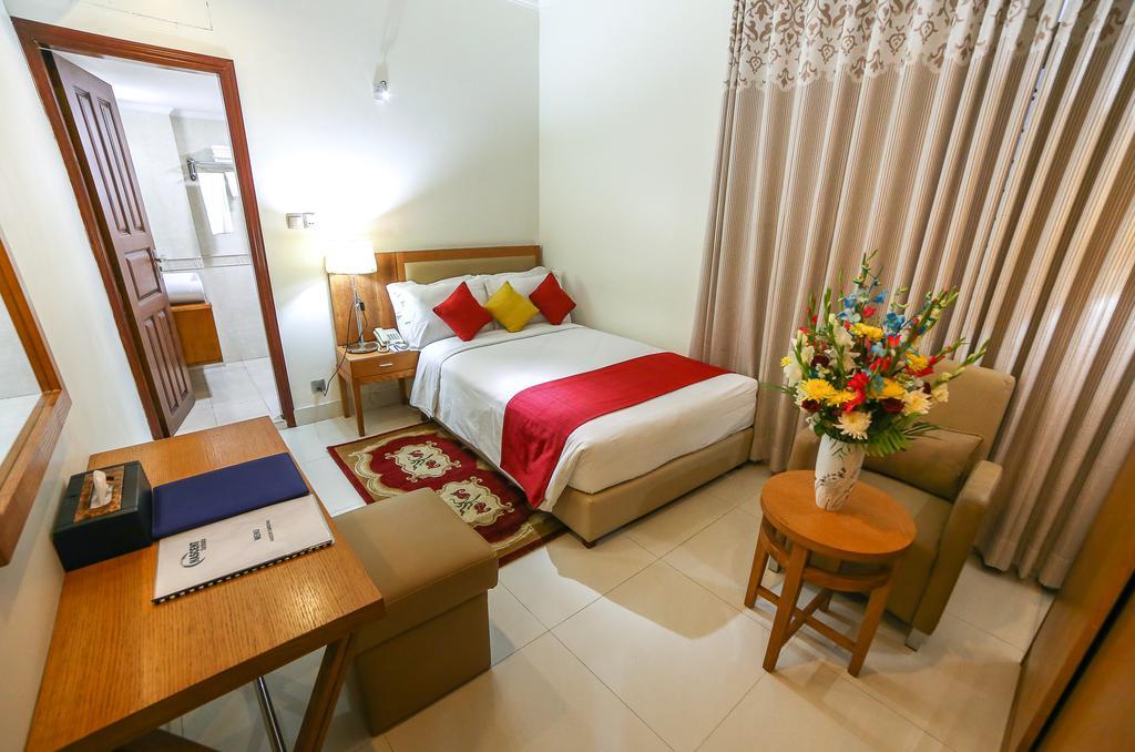 Nascent Gardenia Luxury Suites Дакка Номер фото